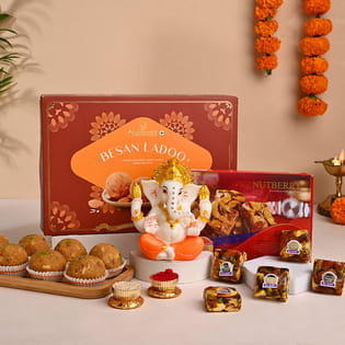 Graceful Ganesha Idol With Besan Laddoo N Mewa Bites