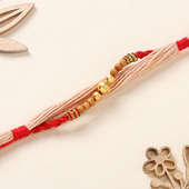 Graceful Golden Beads Rakhi