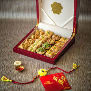 Graceful Rajputana Rakhis With Assorted Baklawa Box