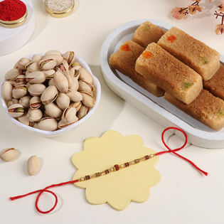 Graceful Rakhi With Pistachios N Milk Cake
