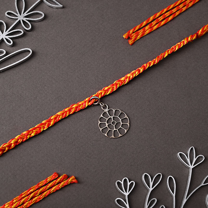 Graceful Silver Floral Charm Rakhi