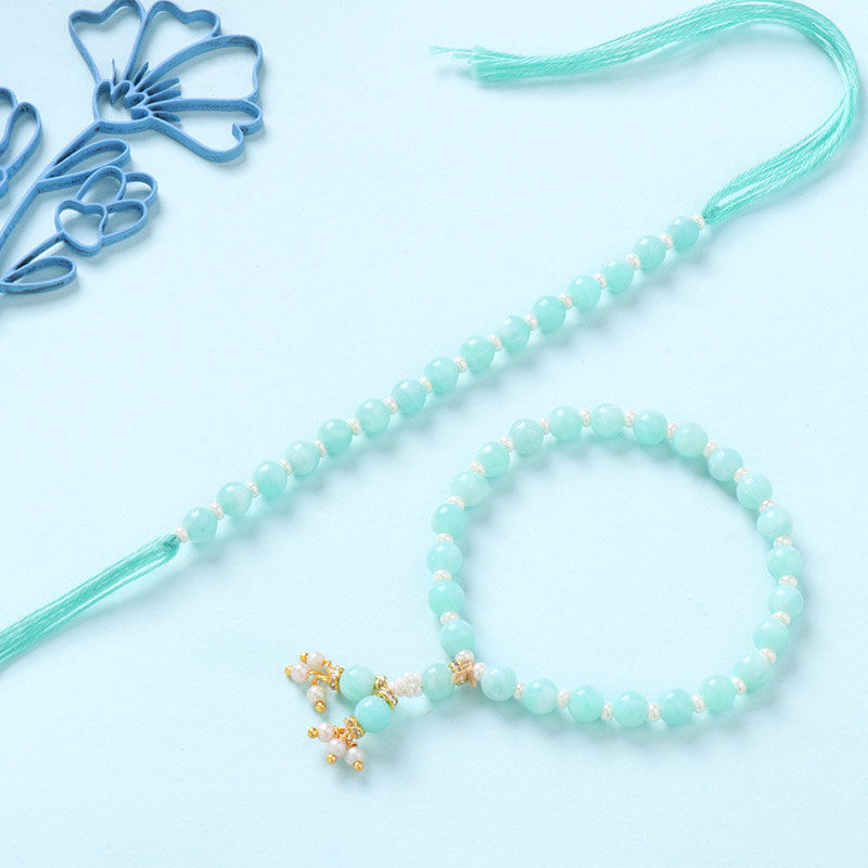 Green and White Beaded Bhaiya Bhabhi Rakhi Set With Sweets