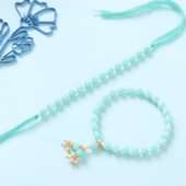 Green and White Beaded Bhaiya Bhabhi Rakhi Set With Sweets