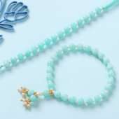 Green and White Beaded Bhaiya Bhabhi Rakhi Set With Sweets