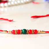 Green Red Pearls Rakhi - One Pearl Diamond Rakhi with Roli Chawal