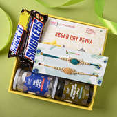 Top View of Designer Rakhis with Paan Flavoured Petha & Chocolates 