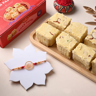 Divine Hamsa Charm Rakhi With Soan Papdi to USA