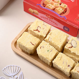 Divine Hamsa Charm Rakhi With Soan Papdi to USA