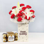 Hbd Red Carnations White Lilies N Rocher Combo - Bunch of 12 Red Carnations and 2 White Lilies with Birthday Flower Box and Pack of 16 Ferrero Rochers