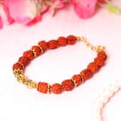 Holy Rudraksha Rakhi - One Designer Rakhi and Complimentary Roli and Chawal