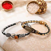 Send Holy Shiva Gold N Silver Rakhis to USA for Brother Online