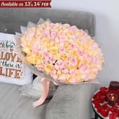 Embrace Of Pink And Peach Roses