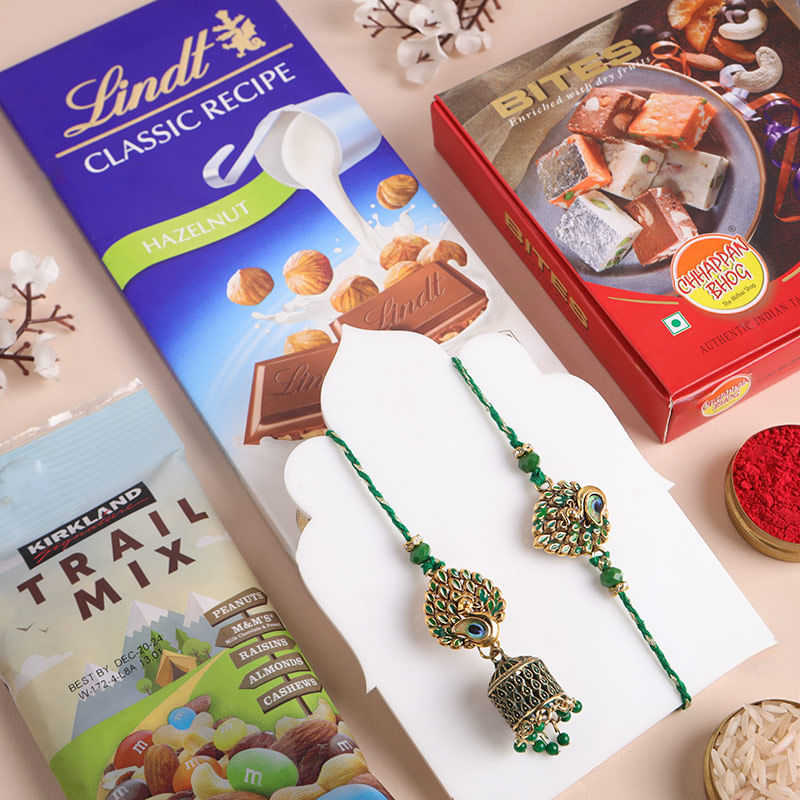 Intricate Peacock Bhaiya Bhabhi Rakhis With Treats