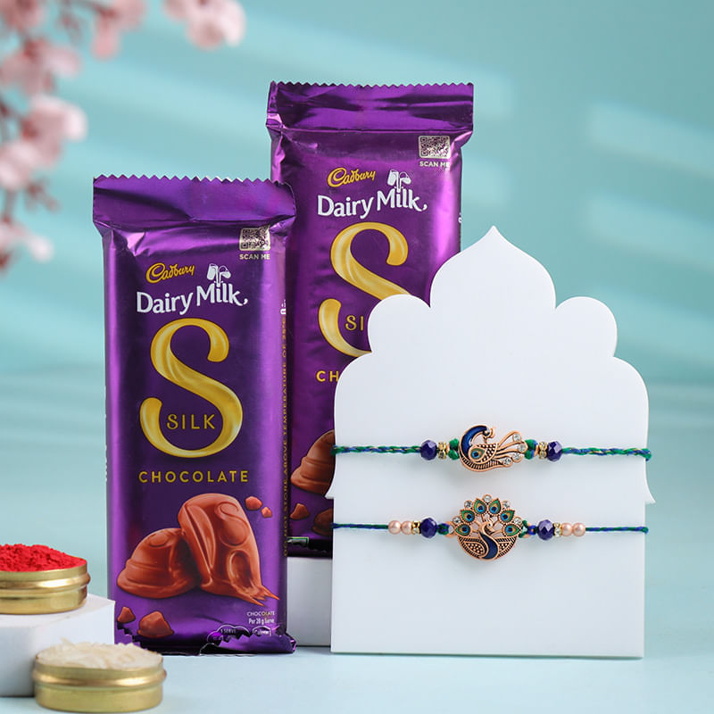Intricate Peacock Rakhi Duo With Chocolates-Singapore