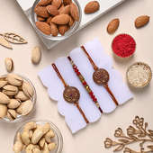 Intricate Rakhi Trio With Almonds