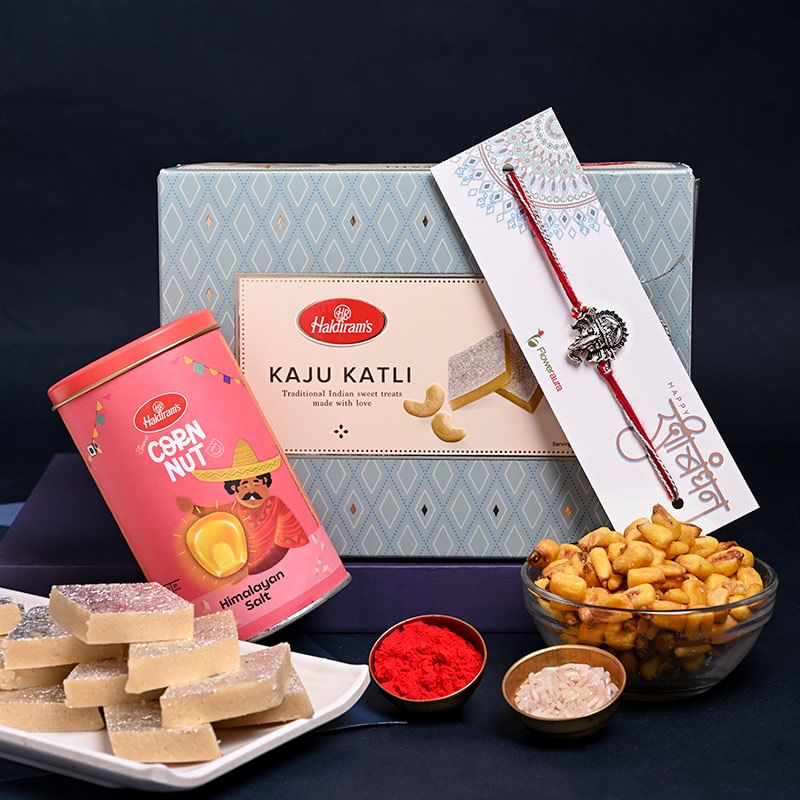 Send Kaju Katli N Corn Nut With Ganesha Rakhis in UAE