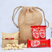 Kitkat Nut Rakhi Combo - One Pearl Rakhi with Complimentary Roli and Chawal and 100gm Cashews in Jute Potli and 3 Kitkats - 18gm each