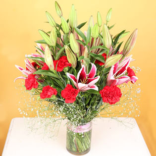 Lily N Carnation In Glass - Arrangement of 12 Pink Carnations and 6 Pink Lilies with Glass Vase
