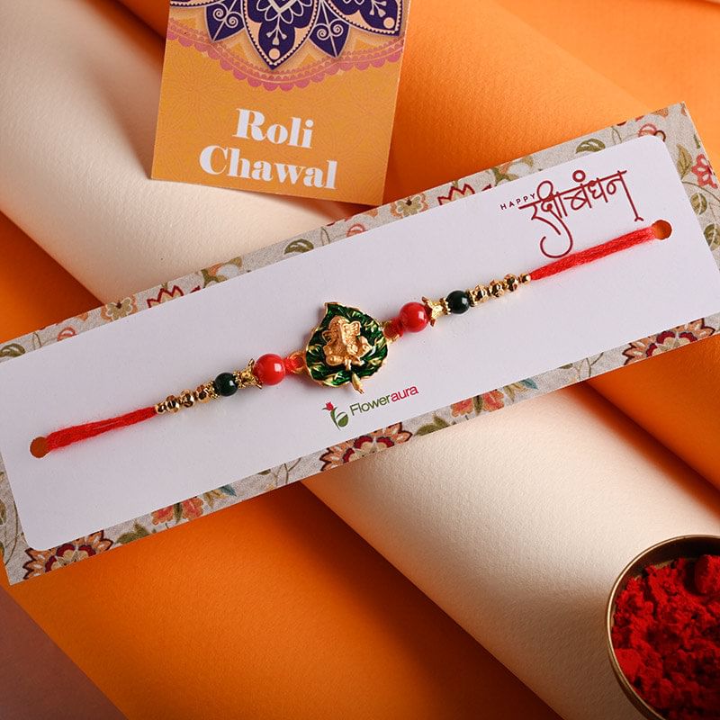 Order Lord Ganesha Beads Rakhi Online from FlowerAura - Divine Rakhi