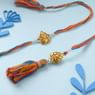 Lord Ganesha Charm Rakhi for Bhaiya Bhabhi