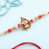 Lord Ganesha N Leaf Motif Rakhi