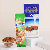 Send Lotus Couple Rakhi With Lindt N Almonds to Canada Online