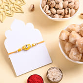 Lotus Rakhi With Pistachios N Shakarpara