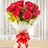 Front view of bunch of 12 red Roses - A gift of Love And Luck Hamper
