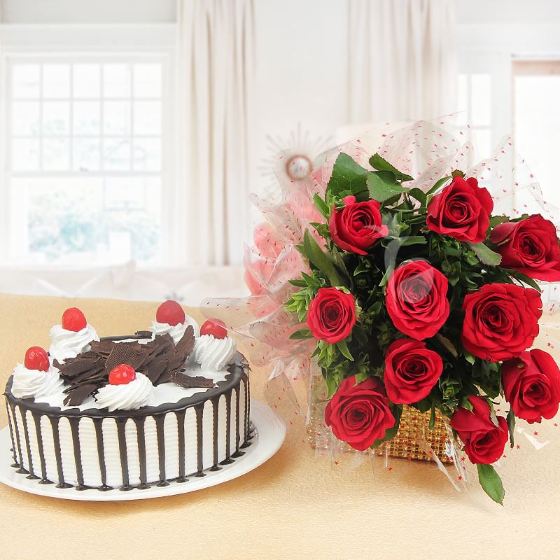 Lovingly Yours - Combo of 10 red roses with half kg black forest cake