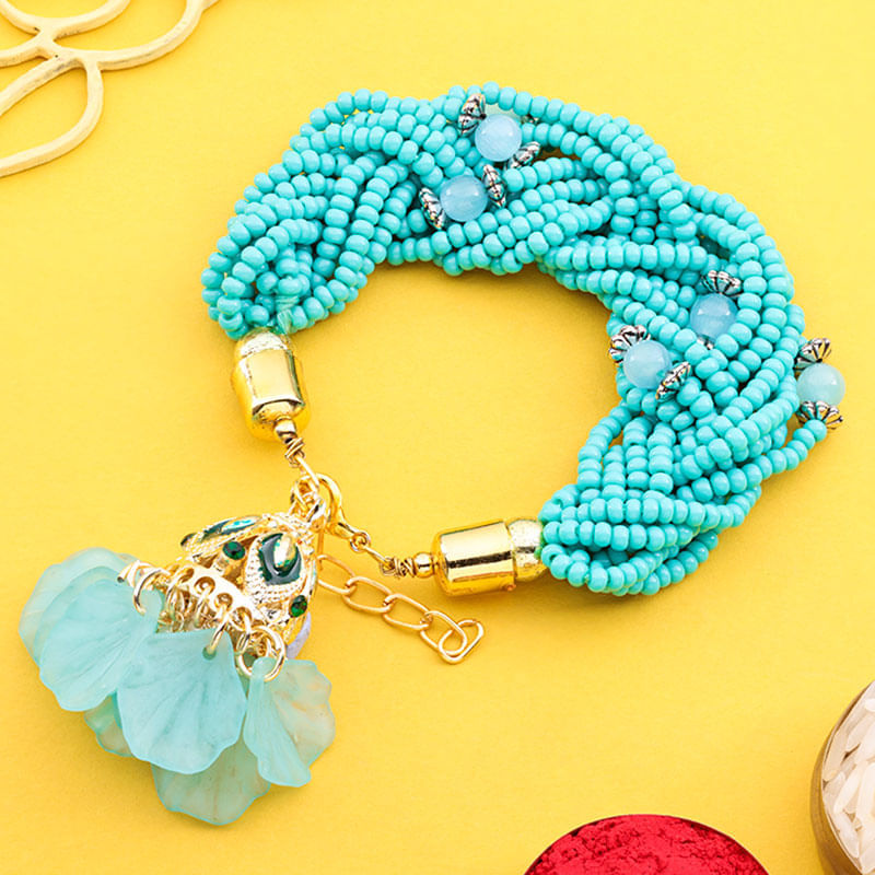 Lumba Rakhi With Petal Dangler