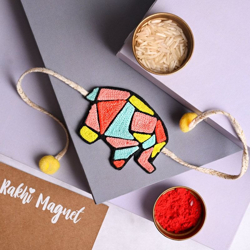 Send Cartoon Rakhi For Kids Online - Magnetic Elephant Rakhi