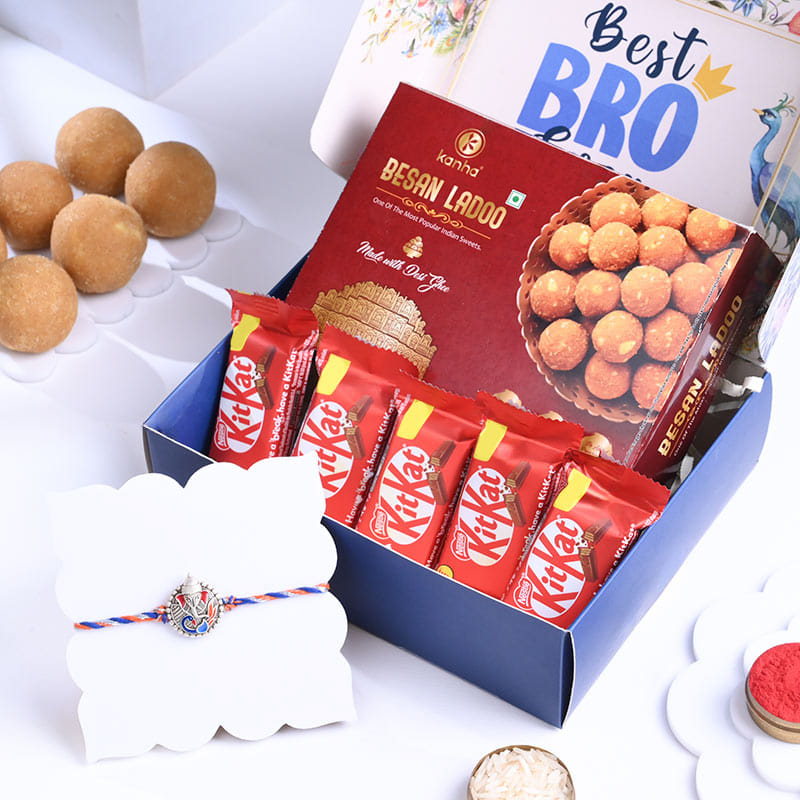 Majestic Ganesha Rakhi with Sweets and Chocolate Hamper