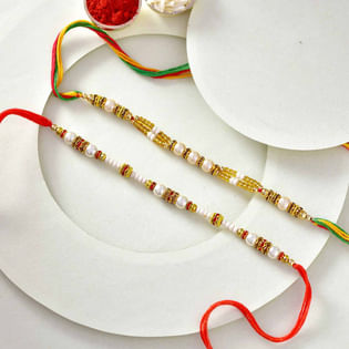 Majestic Pearl Embellished Rakhi Duo