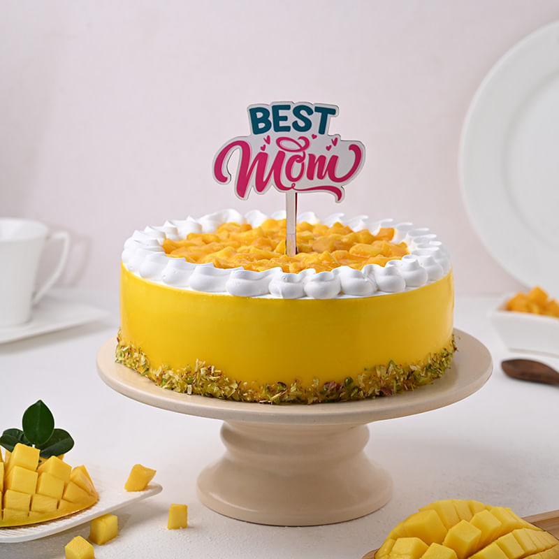 Mango Pistachio Cake With Mom Topper