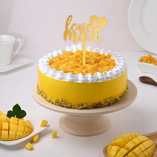 Mango Pistachio Cake With Mom Topper
