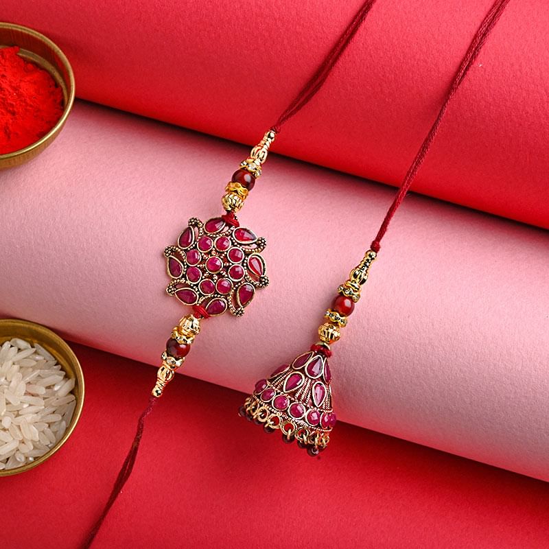 Send Maroon Traditional Rakhi Duo for Bhaiya Bhabhi Online - Lumba Rakhi