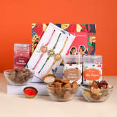 Order Set of 3 For Brother With Dry Fruits Online - Meenakari Floral Rakhi Hamper Featuring Choco Cookies Milk Hazelnut Mix Fruits