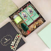 Merry Christmas Gift Box - Combo of chocolates, scented candles, bells and Christmas trees