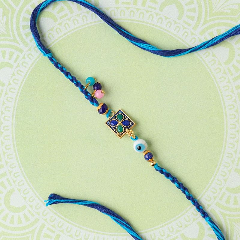Mesmerising Blue Floral Dial Rakhi for Brothers