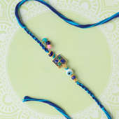 Mesmerising Blue Floral Dial Rakhi for Brothers