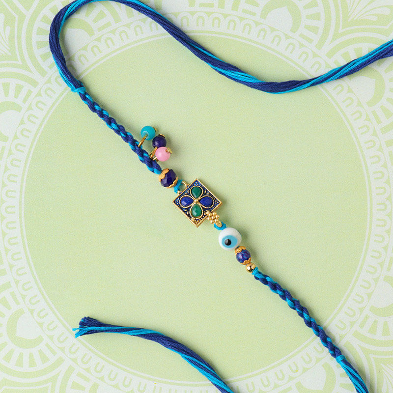 Mesmerising Blue Floral Dial Rakhi