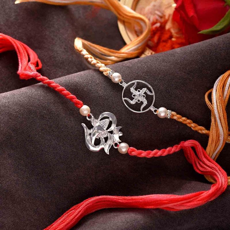 Mesmerizing Sterling Silver Swastika N Om Rakhi Duo
