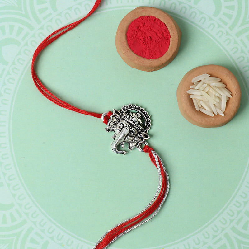 Order Ganesha Oxidised Metal Rakhi