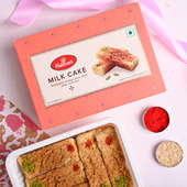 Send Rakhi Sets online for Brother - Milk Cake With Rabri Almonds N OM Rakhi