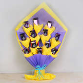 Milky Chocolicious Bouquet - Bouquet of 12 Dairy Milk Chocolates in Violet and Yellow Paper Packing
