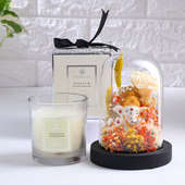 Mimosa N Cardamom Candle With Ganesha In Preserved Flowers