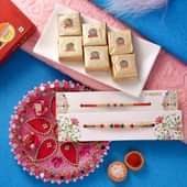Mixed Bites With Embellished Thali N Two Rakhis