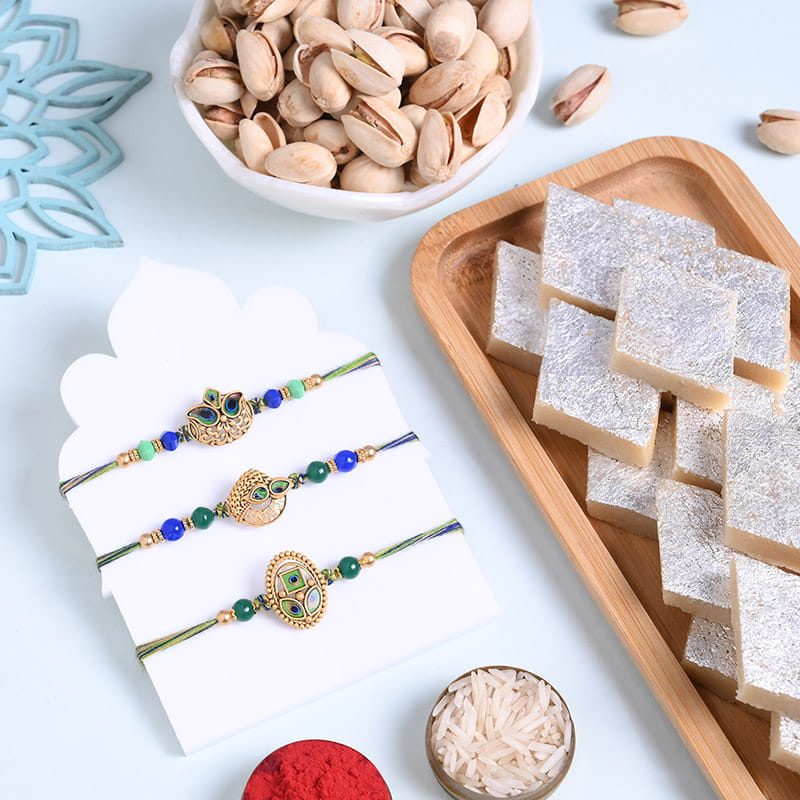 Morpankh Charm Rakhi Trio With Sweets N Nuts