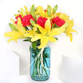 Arrangement of 4 Yellow Lilies & 6 Red Carnations -Mothers Day Flowers And Card Gift
