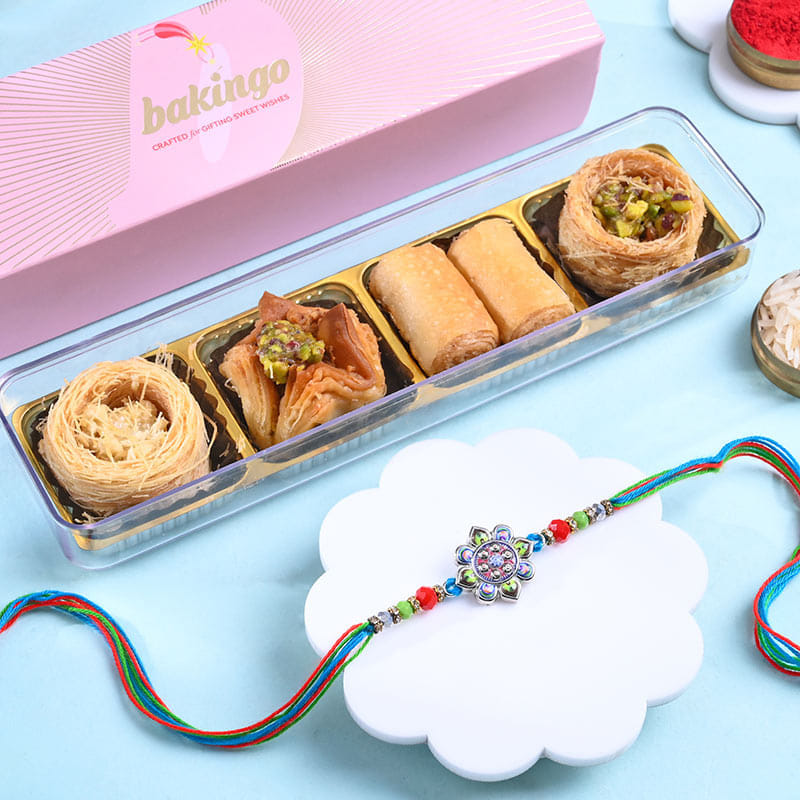 Multicolour Floral Rakhi N Baklawa Fusion Sweets